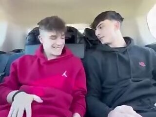 Two hunks fuck in a car
