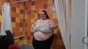 SSBBW GIANT SQUEEZES INTO SWIMWEAR WITH HELP FROM A FRIEND