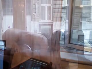 two fine  have sex by the window so people could enjoy the view