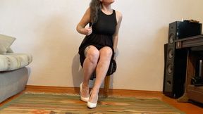 white high-heeled shoes av