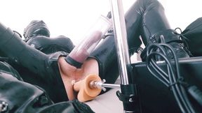 Hooded CD in latex bodysuit fucked by machine and play with ass-pussy