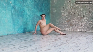 Flexible babe in glasses Kim Nadara stretching