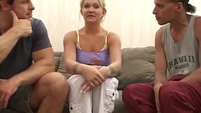 Horn-mad sinful blonde bitch works on two huge cocks on the sofa (FMM)