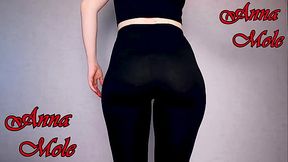 Wearing black leggings I spank a big round ass PAWG