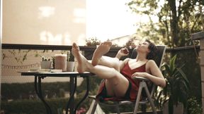 Goddess ignoring you while eating a peach on her balcony