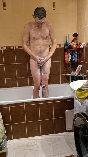 Naughty young daddy takes a shower