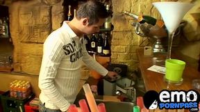 Cute gay guy wanks behind bar until he cums in a glass