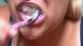 Tamil brushing her teeth close