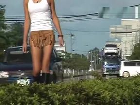 Aya walking around with ripped up skirt near road