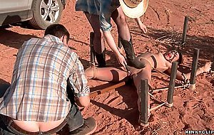 Bound hitchhiker anal toyed in desert