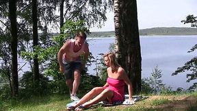 Ardent blond haired MILF lets dude finger her pussy near the river