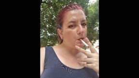 Smoking a Marlboro in a public park 720HD