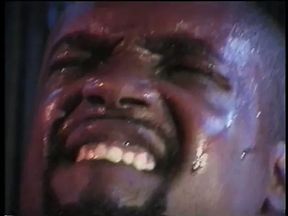 Busty ebony whore lays on stage while getting her pussy pounded