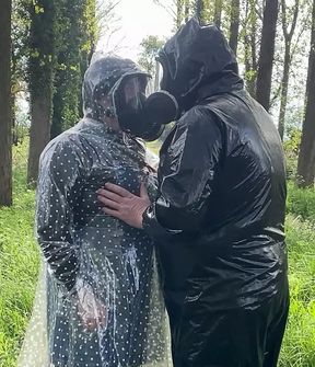 Plastic raincoat and gasmask in the woods
