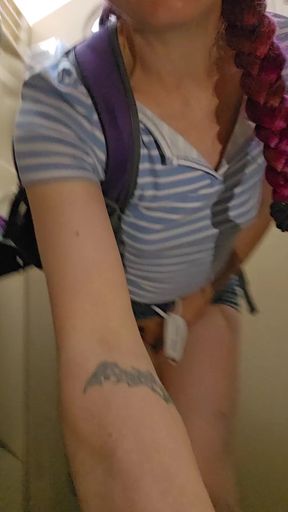 Desperate girl pees in public toilet