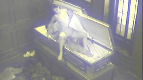 ”Bitch fucks in heavy coffin”