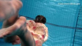 ”Russian chick Edwiga swims nude in the pool in Russia”