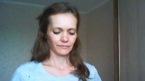 Woman Smiles at the Camera