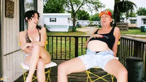 Mature redneck stepmom enjoys a good laugh with her young stepchild on the porch