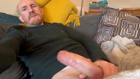 Wanking on the sofa