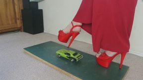 Giantess Lily Kink First toy car crush of a Plymouth Barracuda in big red high heels right view