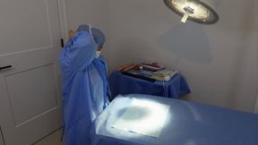 Dr Jess wears surgical PPE to give her patient a firm spanking and stretch his asshole