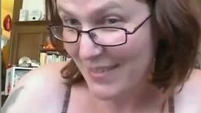 Short haired mature nerdy bitch flashes her ugly tits and huge ass