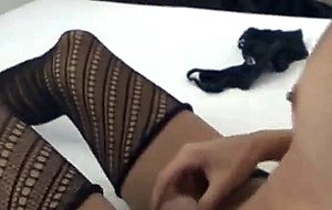 Horny blonde in stockings beating off