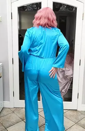 Hot crossdresser in full satin jumpsuit