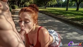 the lusty ginger cheerleader in her tiny skirt greedily sucks and cums in the park.[ai]