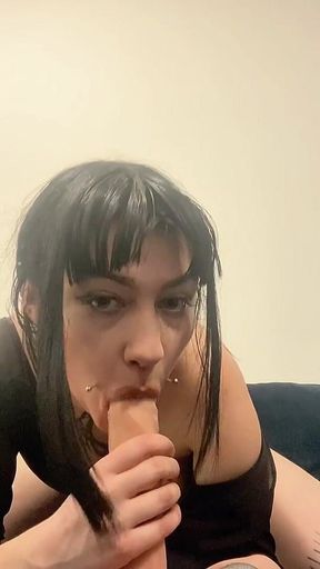 A Beautiful and Passionate Girl Shows How She Knows How to Suck and Work with Her Sweet Mouth, Swallowing a Deep Rubber Cock!