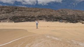 Swimming in jeans and t shirt in the ocean underwater