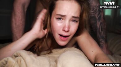 Redhead teen screams as rough doggystyle fucking makes her choke on pillow