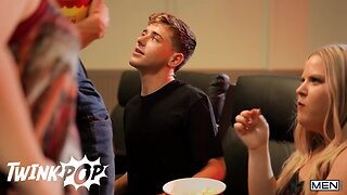 Two straight guys secretly jerk each other’s cocks at the cinema in a steamy twink pop scene