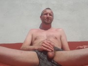 Sunbathing Outside And Wanking