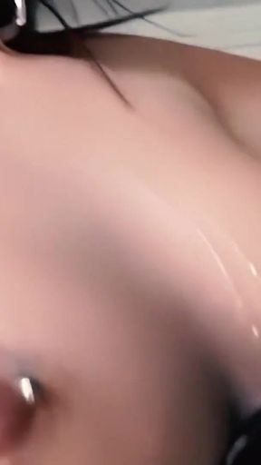 Melissa Lauren Looks Into the Camera as She Licks and Sucks a Black Dick