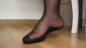 #2 Worship your Mistress's feet in black nylon stockings