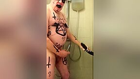 Satan slave takes an enema on Satan's orders