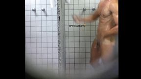 Fit Male Gets Intimate in the Gym Bathroom Shower