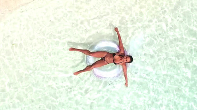 Gorgeous latina beauty Putri Cinta shows off her beach body outdoors
