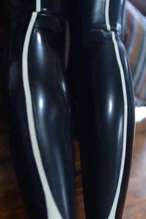 Latex Mistress DominaFire punishing her Latex Slave Girl