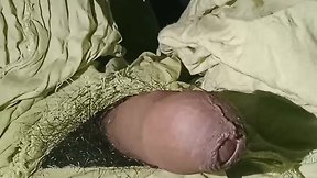 Uncovering and penetrating a big ass with a dildo