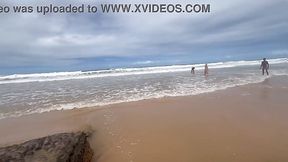 Nude girls having fun on the beach