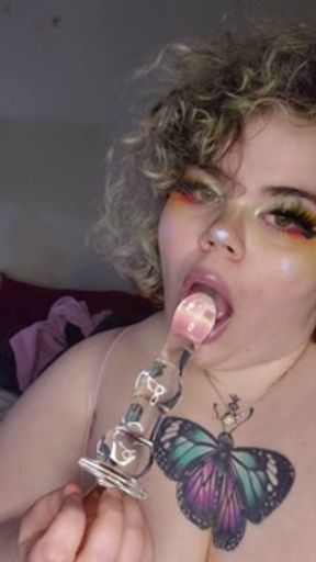 Goth GF sucks on toy for you