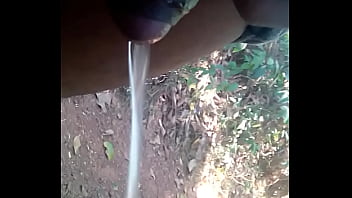 Tamil boy piss on open place