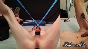 I hang him by his testicles, spanking his ass and cock.