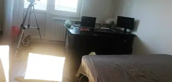 Amateur woman has fun trying on clothes and cutting them  Amateur woman vacuuming naked in the house