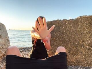 Dominatrix-bitch Nika bangs her thrall with a sex tool in the booty on the beach.
