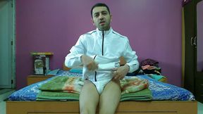 Hot and sexy boy in white jacket and thong getting naked.