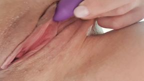 I caress the sweet clitoris with my fingers and a vibrator. Sweet cum up close